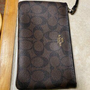 Coach wristlet, size 8" x 5"